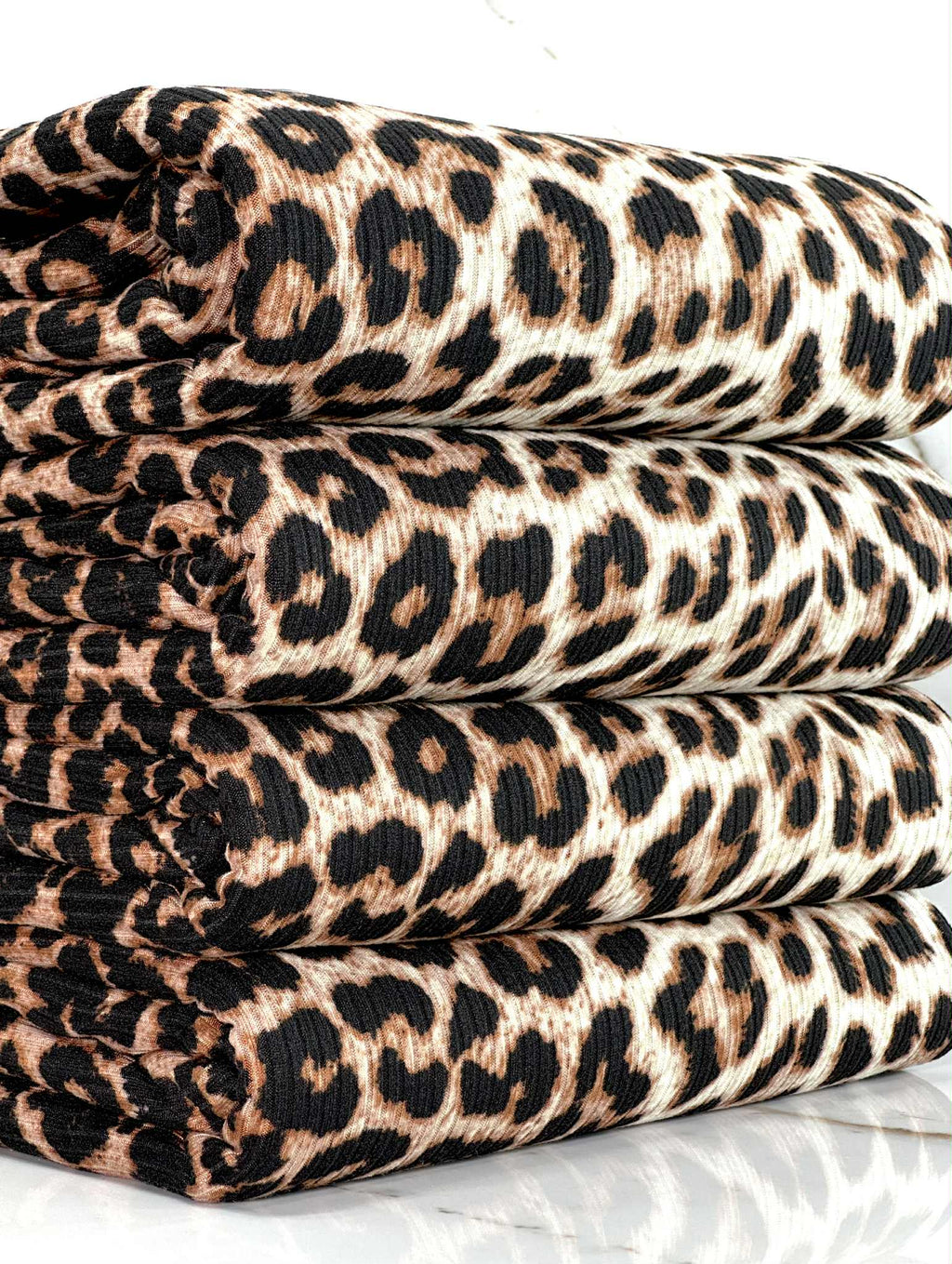 (4X2 YUMMY RIB) BLACK AND TAN CHEETAH