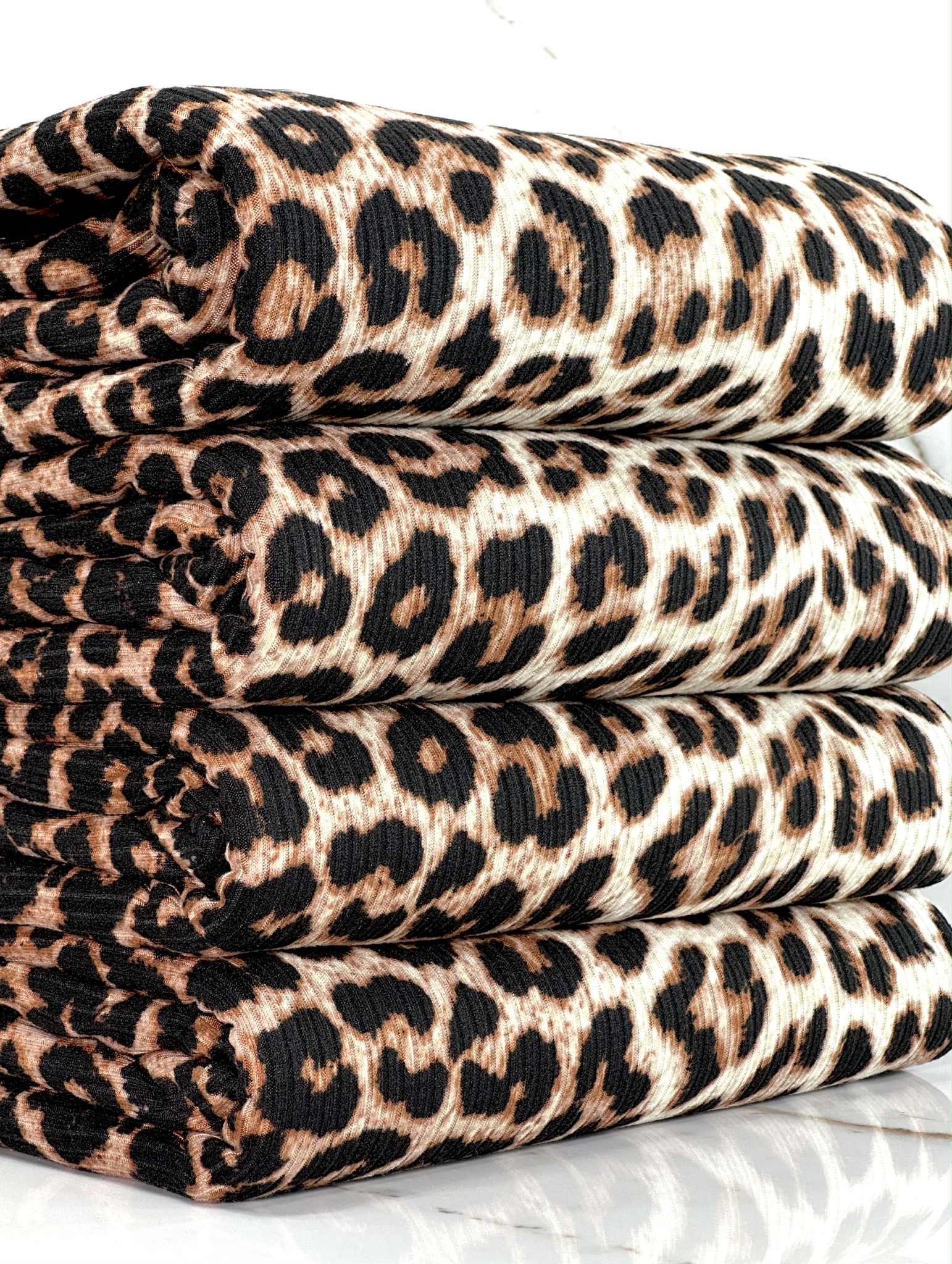 (4X2 YUMMY RIB) BLACK AND TAN CHEETAH