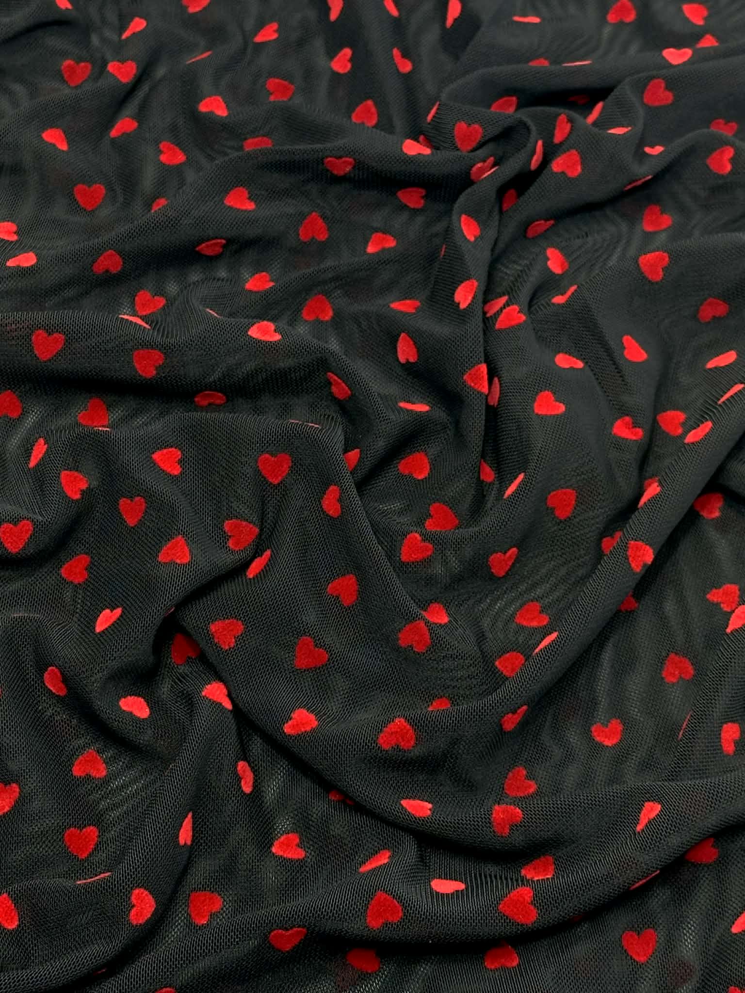 (MESH) TINY RED FLOCK HEARTS ON BLACK