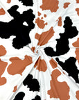 (DBP) VINTAGE BROWN AND BLACK COW PRINT ON OFF WHITE