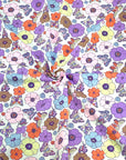 (SWIM) BUTTERFLIES AND FLOWERS ON OFF WHITE