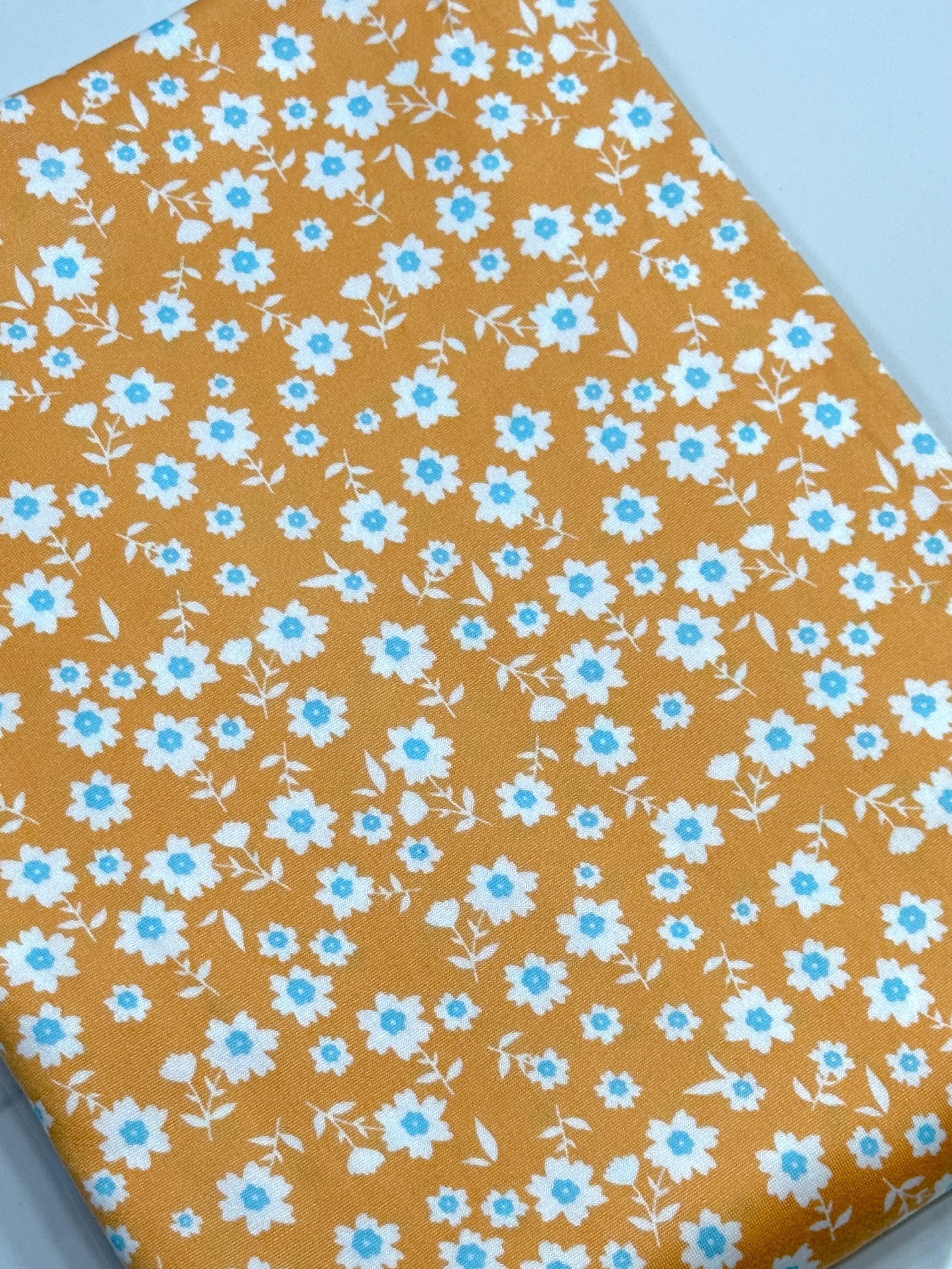 (DBP) TINY DARK MINT AND OFF WHITE FLOWERS ON ORANGE