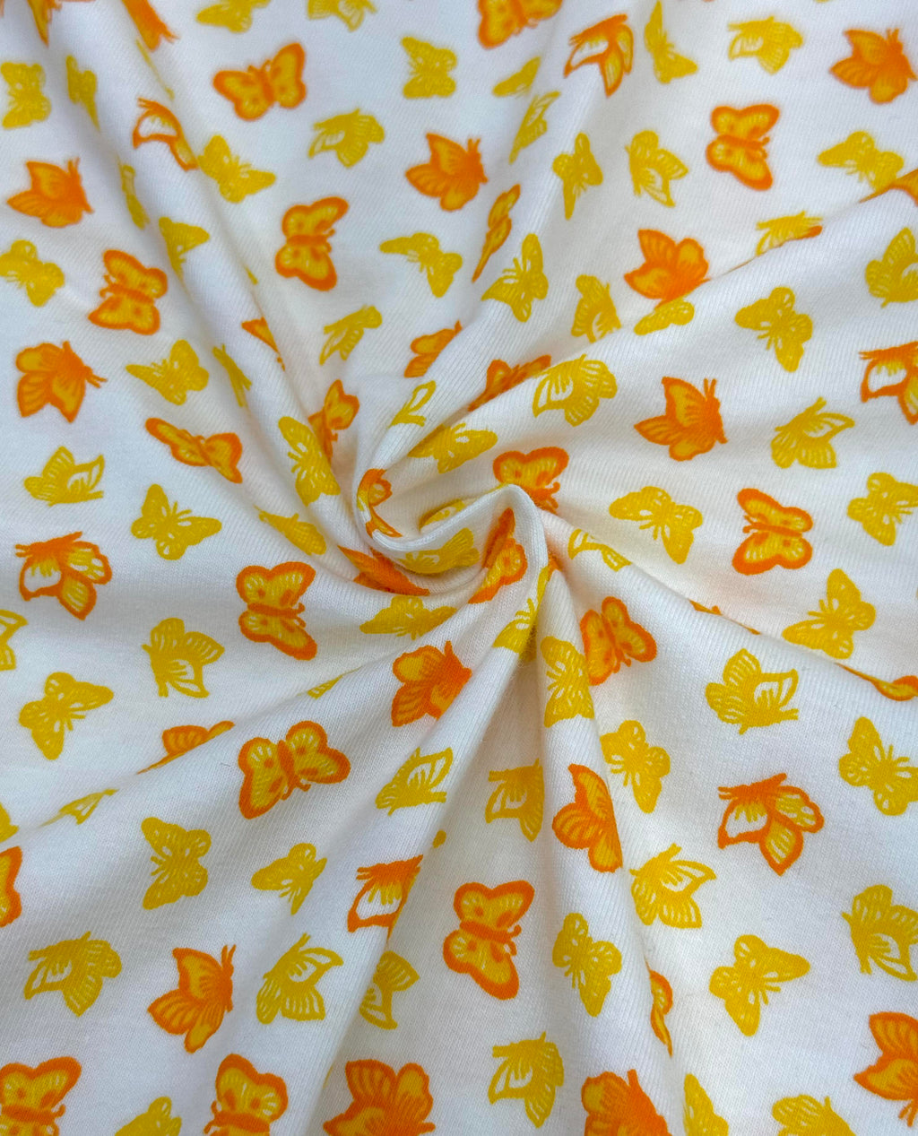 (COTTON SPANDEX) SMALL YELLOW AND ORANGE BUTTERFLIES ON OFF WHITE