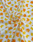 (COTTON SPANDEX) SMALL YELLOW AND ORANGE BUTTERFLIES ON OFF WHITE