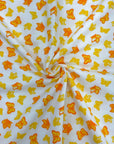 (COTTON SPANDEX) SMALL YELLOW AND ORANGE BUTTERFLIES ON OFF WHITE