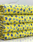 (COTTON SPANDEX) SMALL ROYAL AND BLUE BUTTERFLIES ON YELLOW