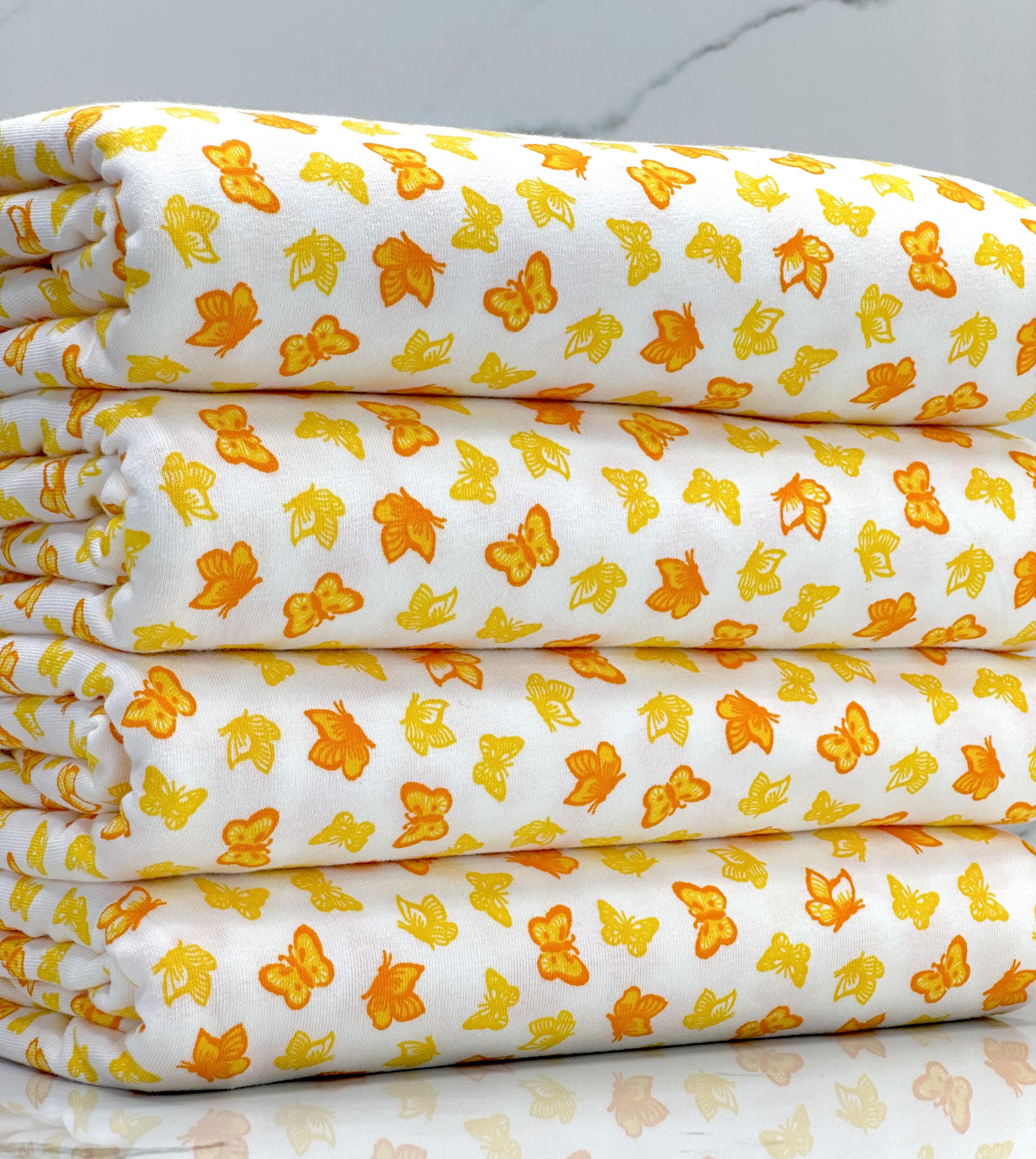 (COTTON SPANDEX) SMALL YELLOW AND ORANGE BUTTERFLIES ON OFF WHITE