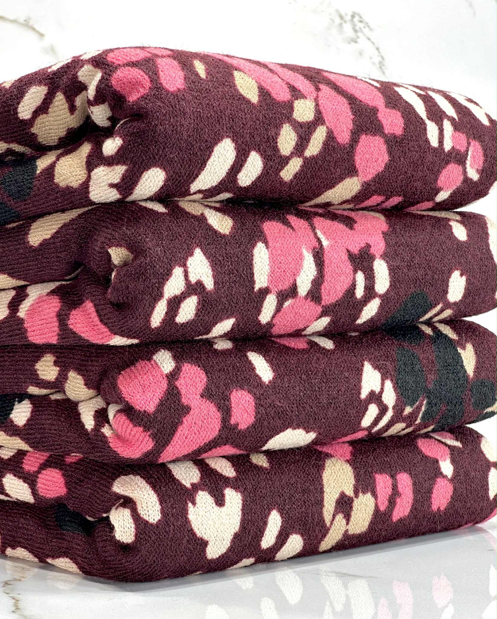 (HACCI SWEATER KNIT) PINK, IVORY, AND BLACK LEOPARD ON BURGUNDY
