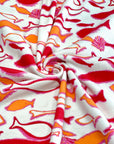 (COTTON BABY RIB) PINK, ORANGE AND RED FISH ON OFF WHITE