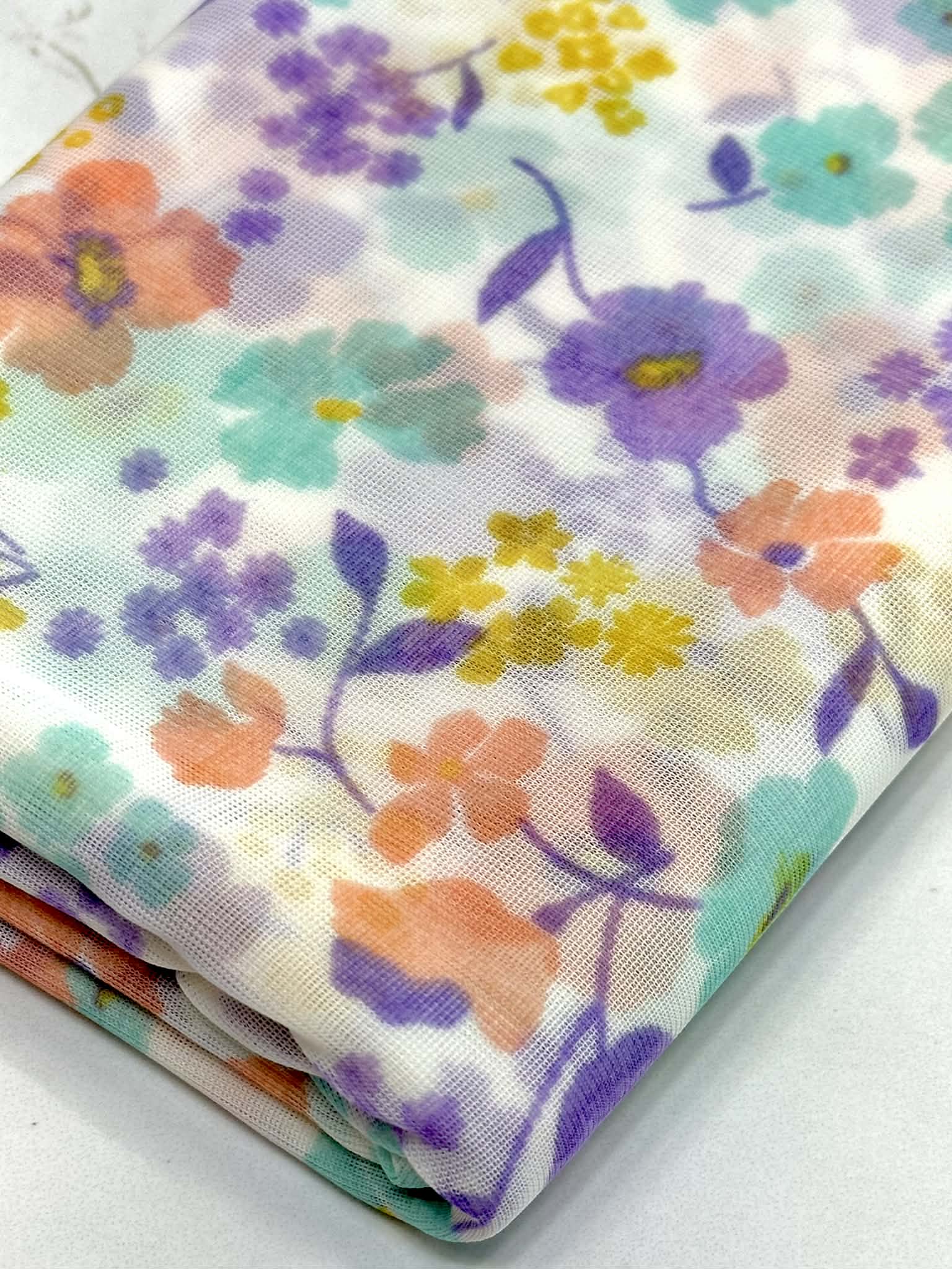 (MESH) MINT, LAVENDER , PEACH, AND YELLOW FLOWERS ON OFF WHITE
