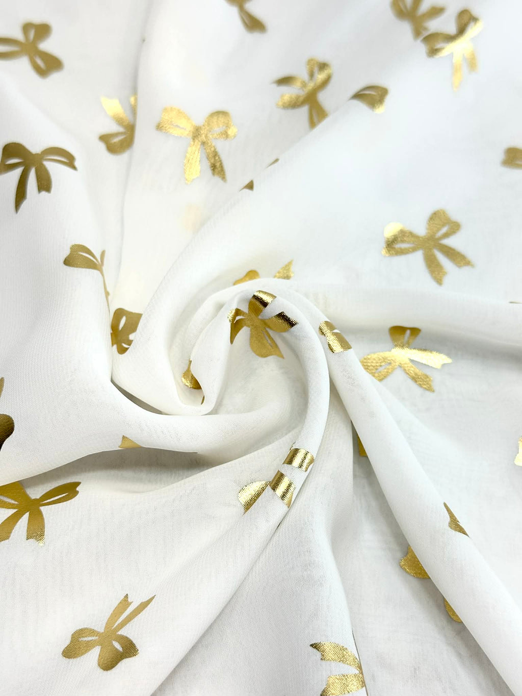 (WOVEN) GOLD BOWS ON OFF WHITE