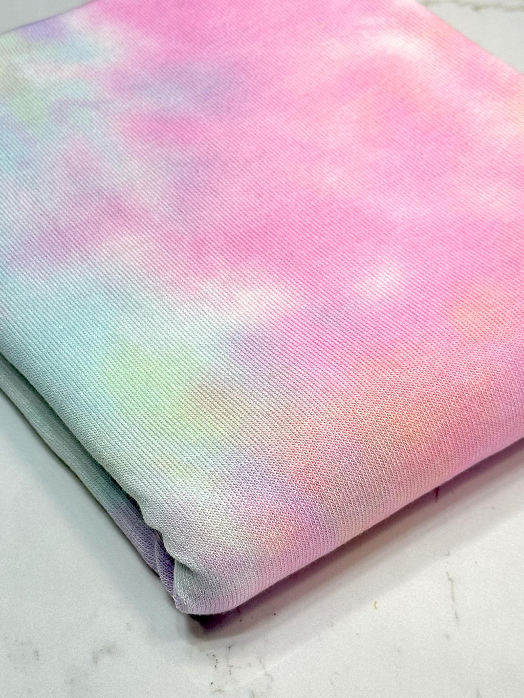 (SWEATER KNIT) LIGHT BLUE, YELLOW, AND PINK TIE DYE
