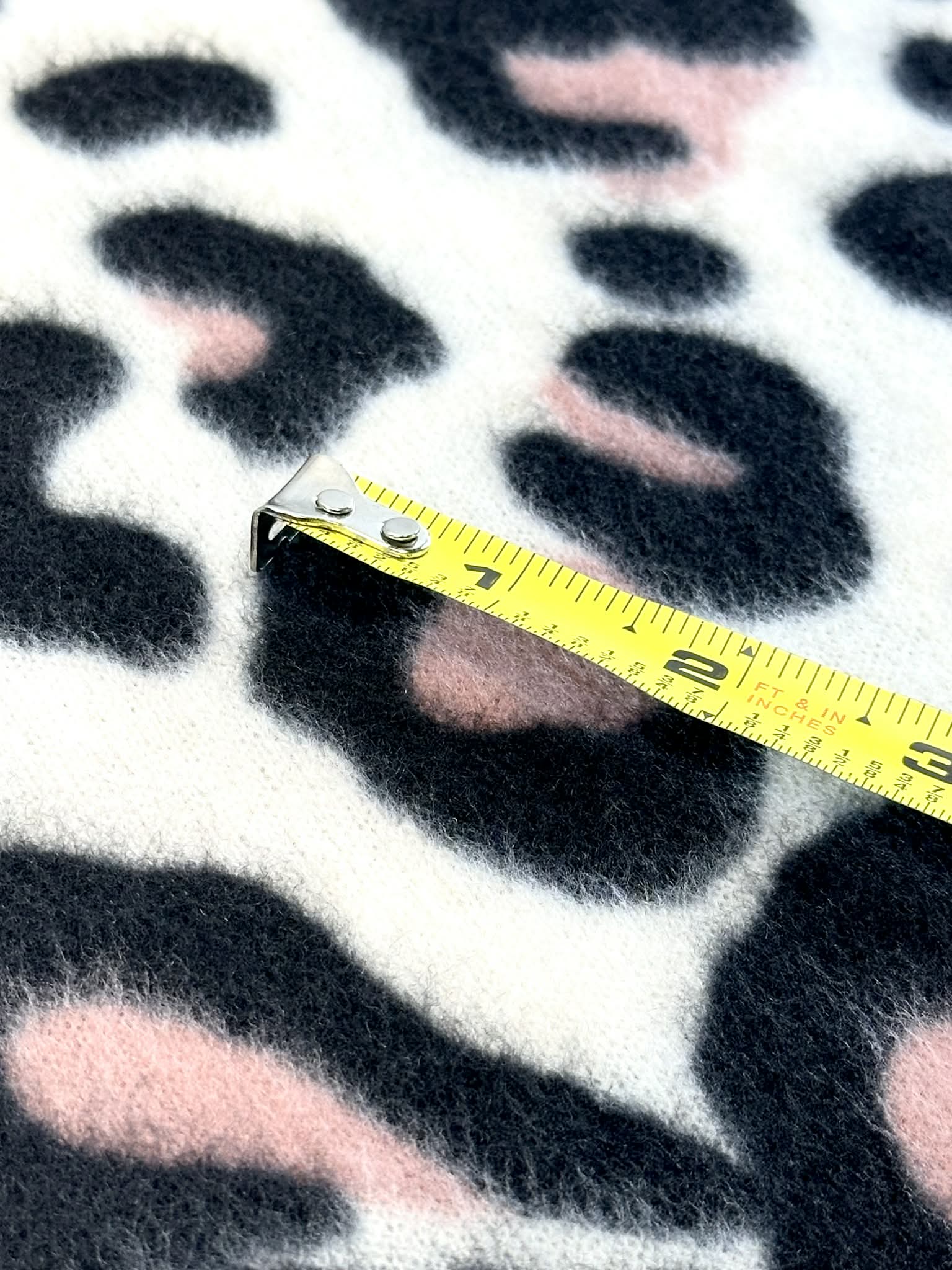 (BRUSHED SWEATER KNIT) BLACK AND CORAL CHEETAH ON OFF WHITE