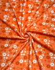 (2X2 YUMMY RIB) BURNT ORANGE AND OFF WHITE TINY FLOWERS ON ORANGE