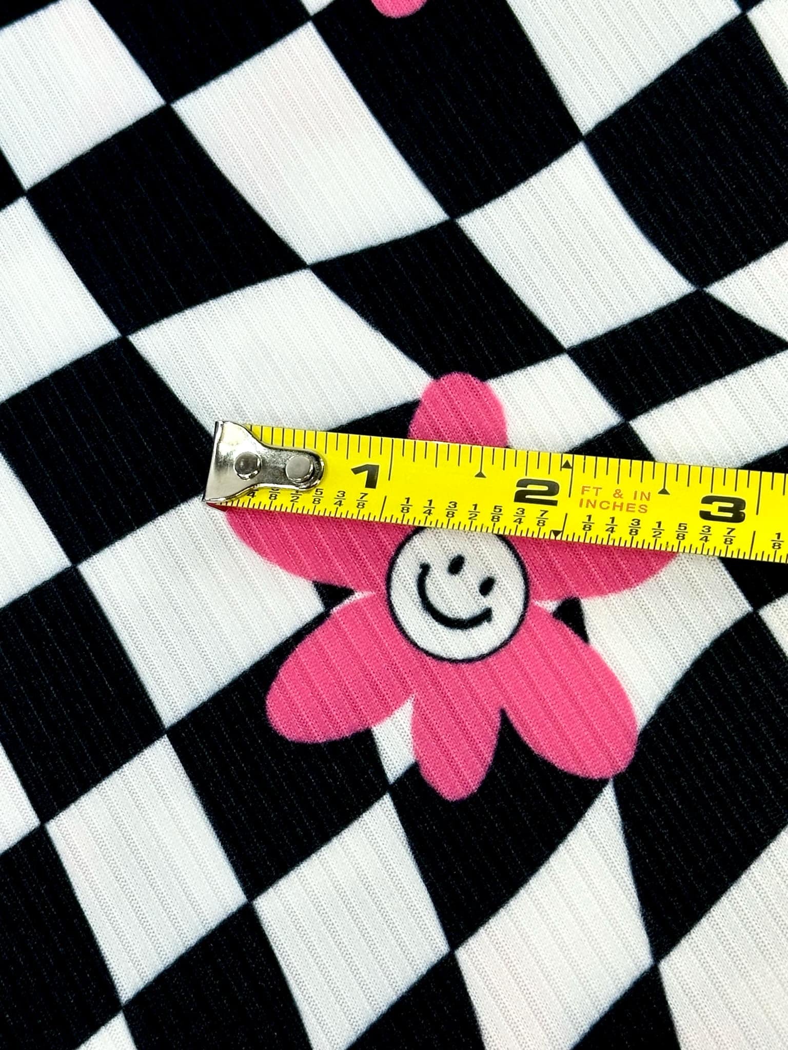 (YUMMY RIB) PINK, WHITE HAPPY FACE FLOWERS ON BLACK CHECKERED WAVE