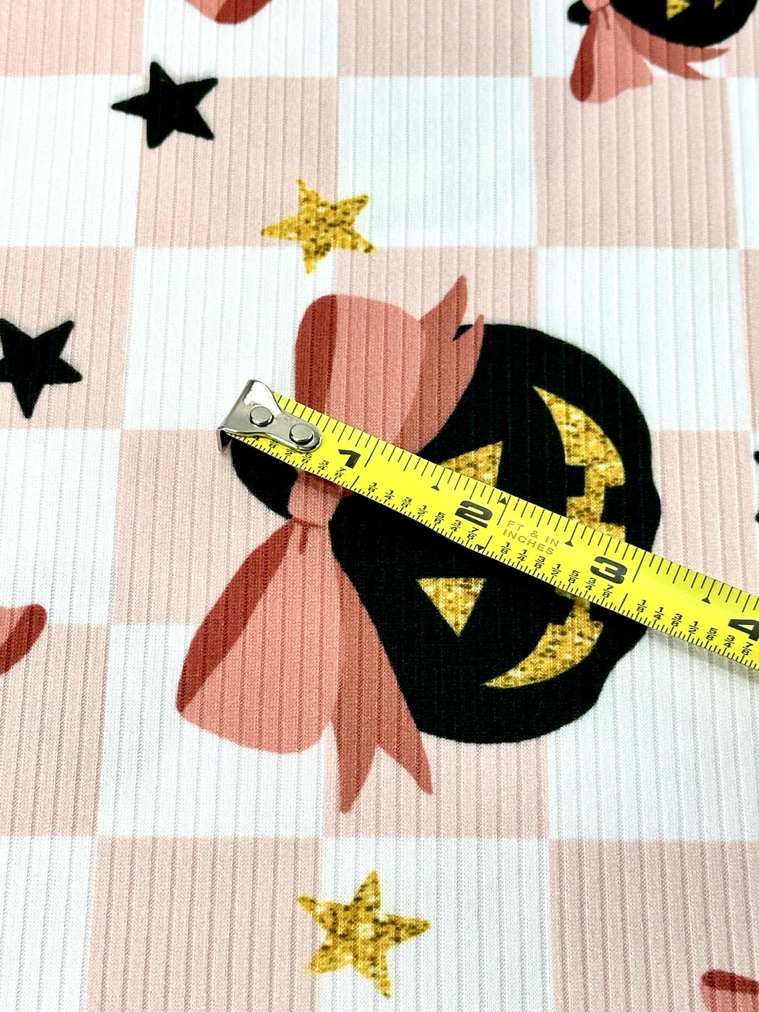 (YUMMY RIB) BLACK PUMPKINS WITH BOWS AND STARS ON LIGHT PINK CHECKERED (3)