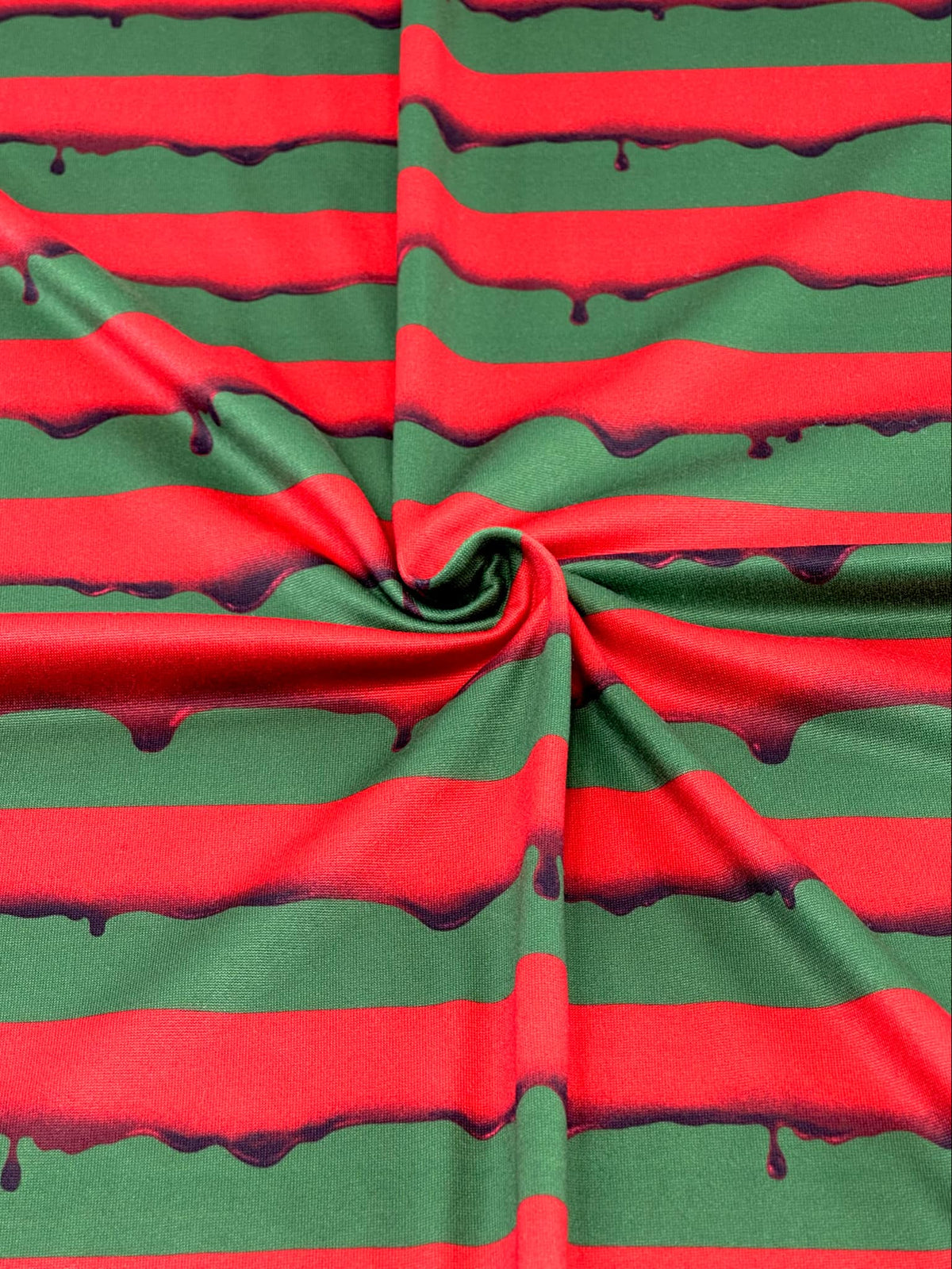 (DBP) DRIPPING RED BLOOD ON DARK OLIVE