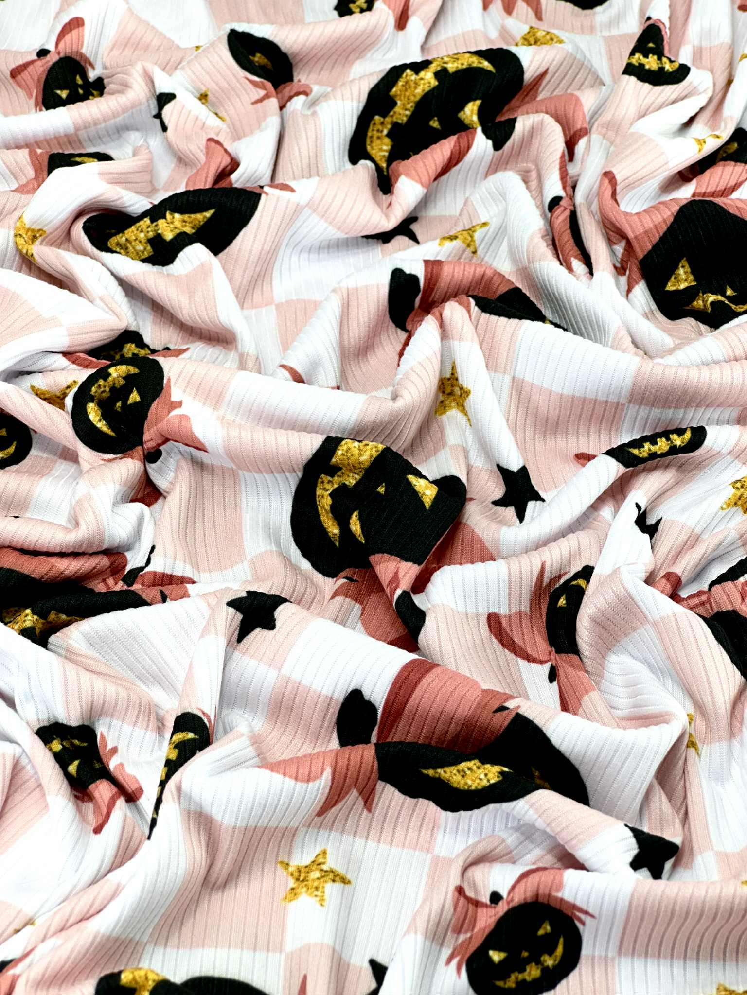 (YUMMY RIB) BLACK PUMPKINS WITH BOWS AND STARS ON LIGHT PINK CHECKERED