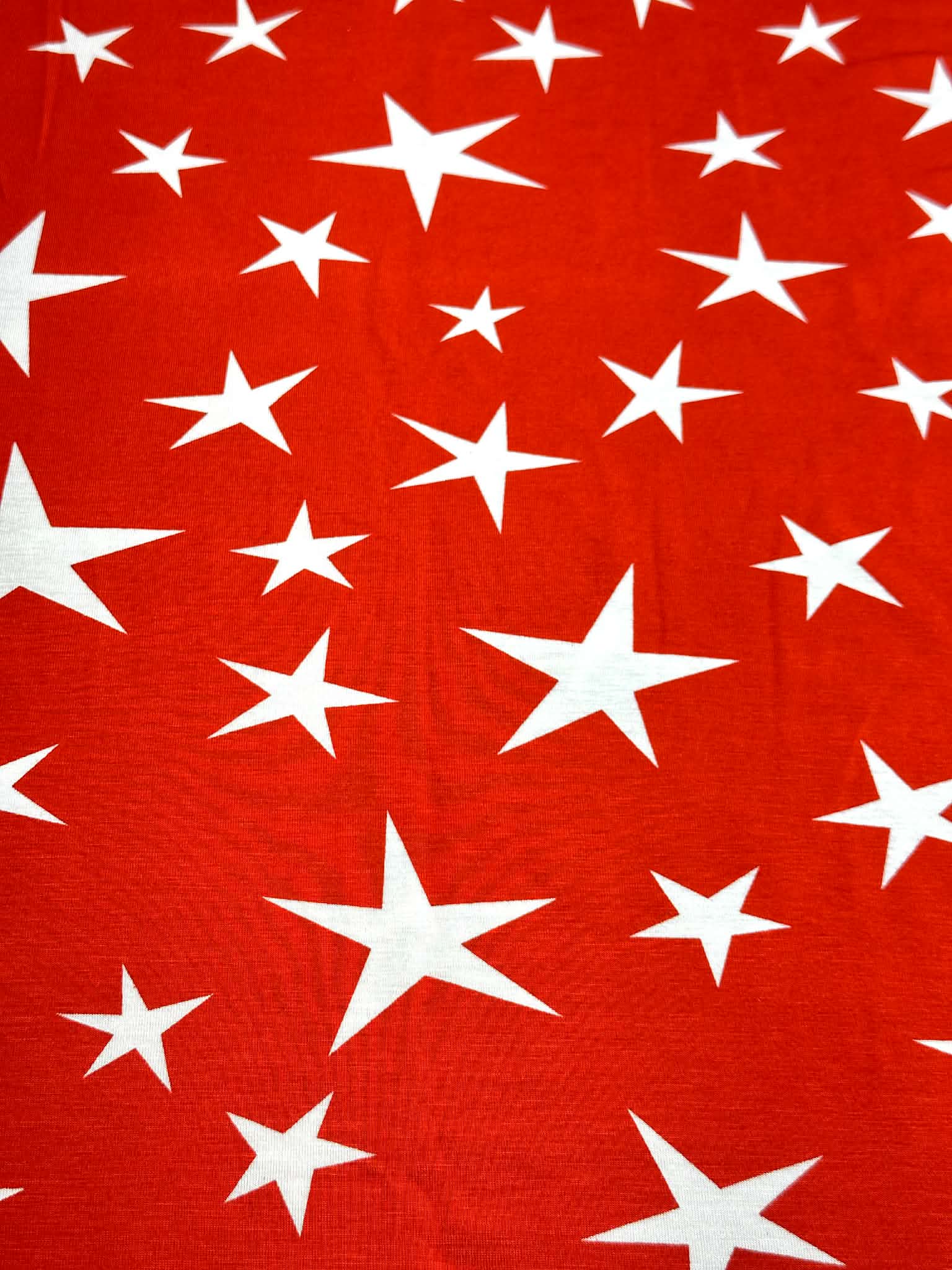 (RAYON  MODAL) OFF WHITE STARS ON RED