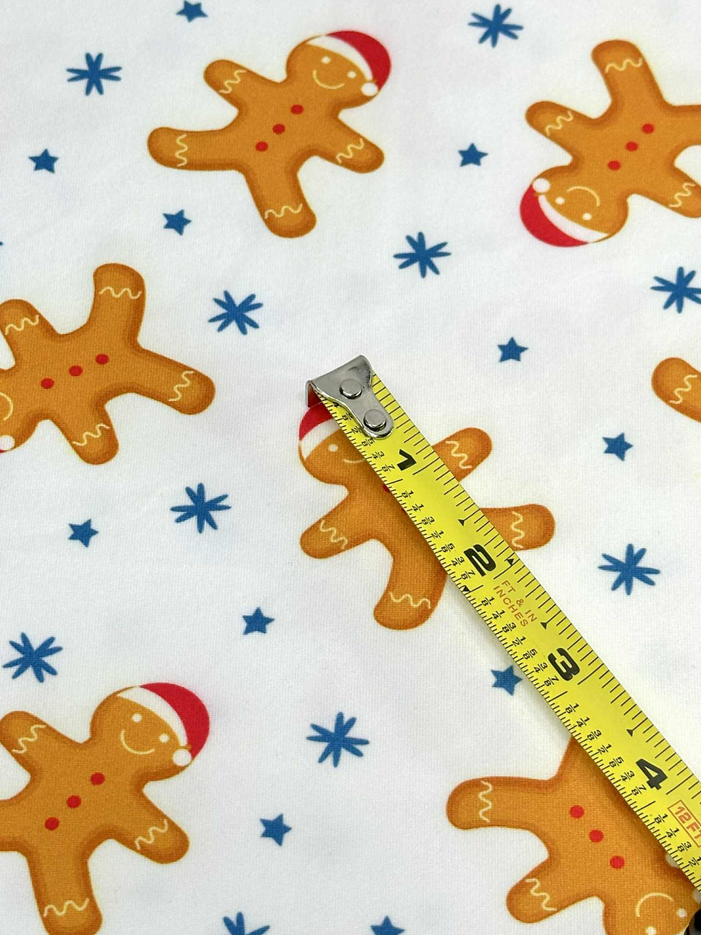 (DBP) MEDIUM GINGERBREAD MAN AND STARS ON OFF WHITE