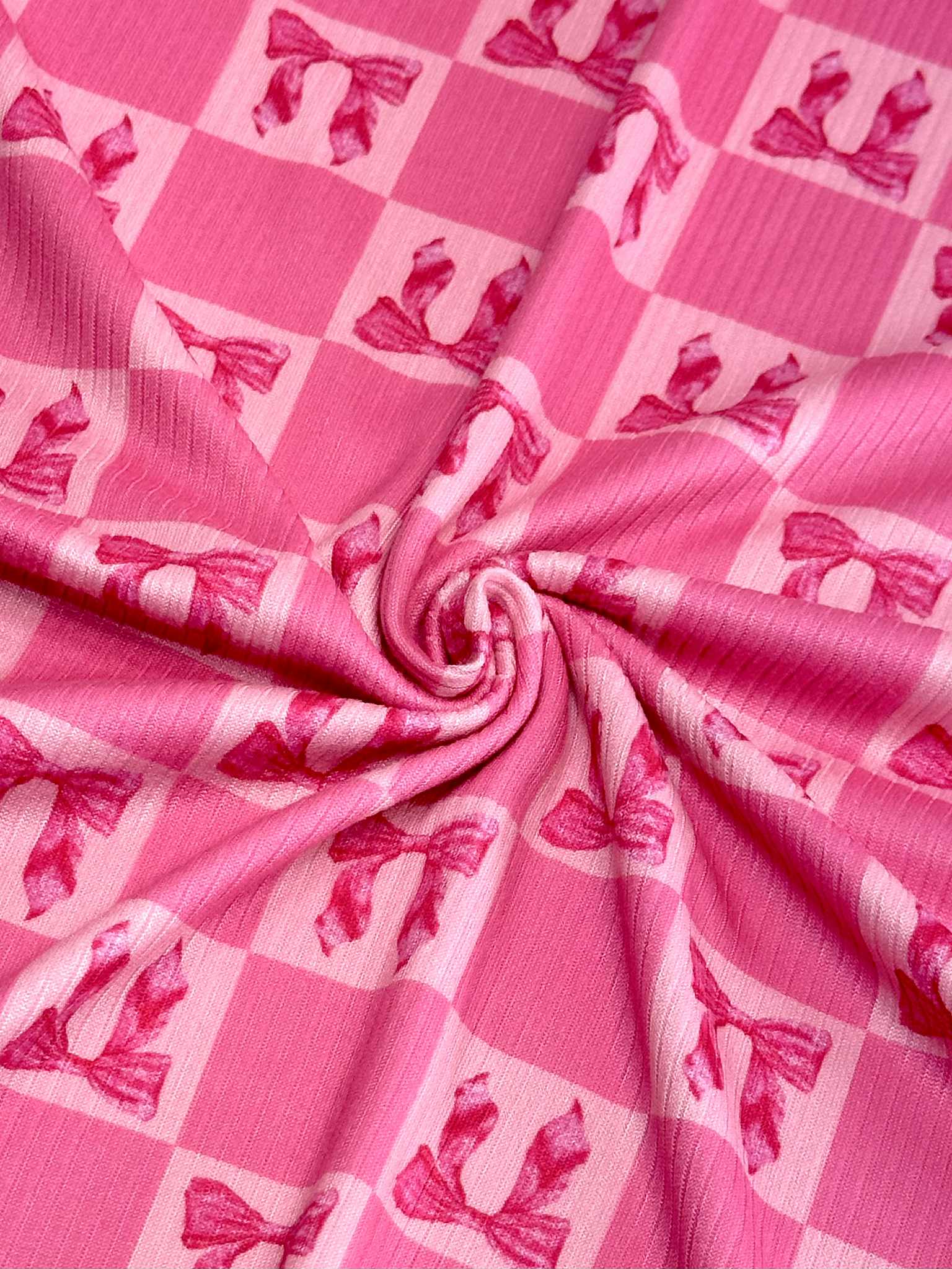 (4X2 RIB) HOT PINK BOWS ON PINK MEDIUM CHECKERED