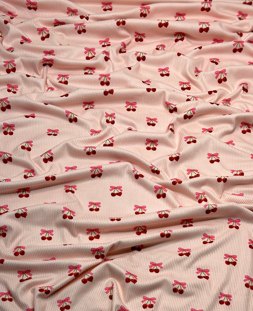 (2X2 BRUSHED RIB) CHERRY HEART WITH BOWS ON BLUSH