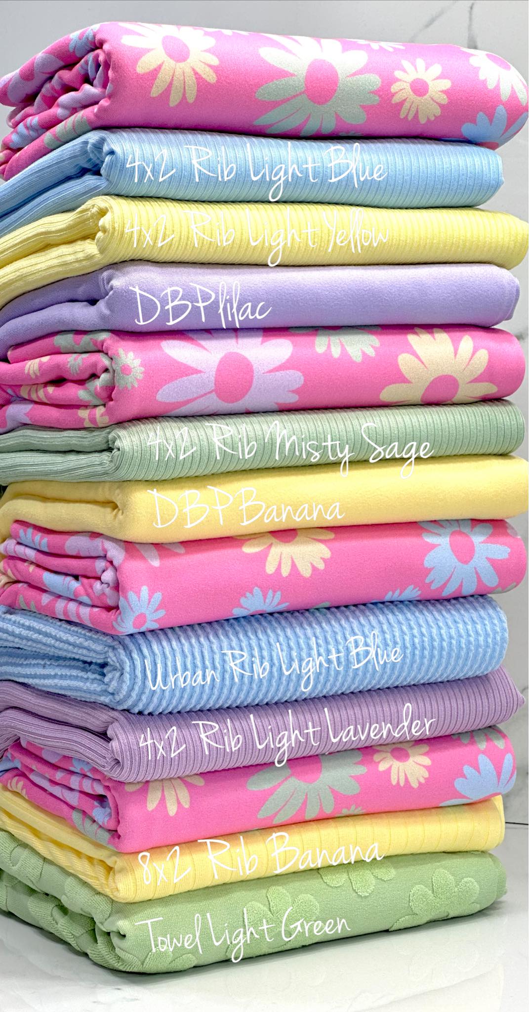 (DBP) LIGHT GREEN, LIGHT YELLOW, LIGHT BLUE, AND LIGHT LAVENDER FLOWERS ON PINK