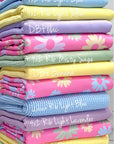 (DBP) LIGHT GREEN, LIGHT YELLOW, LIGHT BLUE, AND LIGHT LAVENDER FLOWERS ON PINK