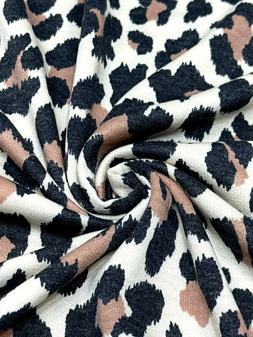 (FRENCH TERRY) BROWN AND BLACK CHEETAH ON CREAM