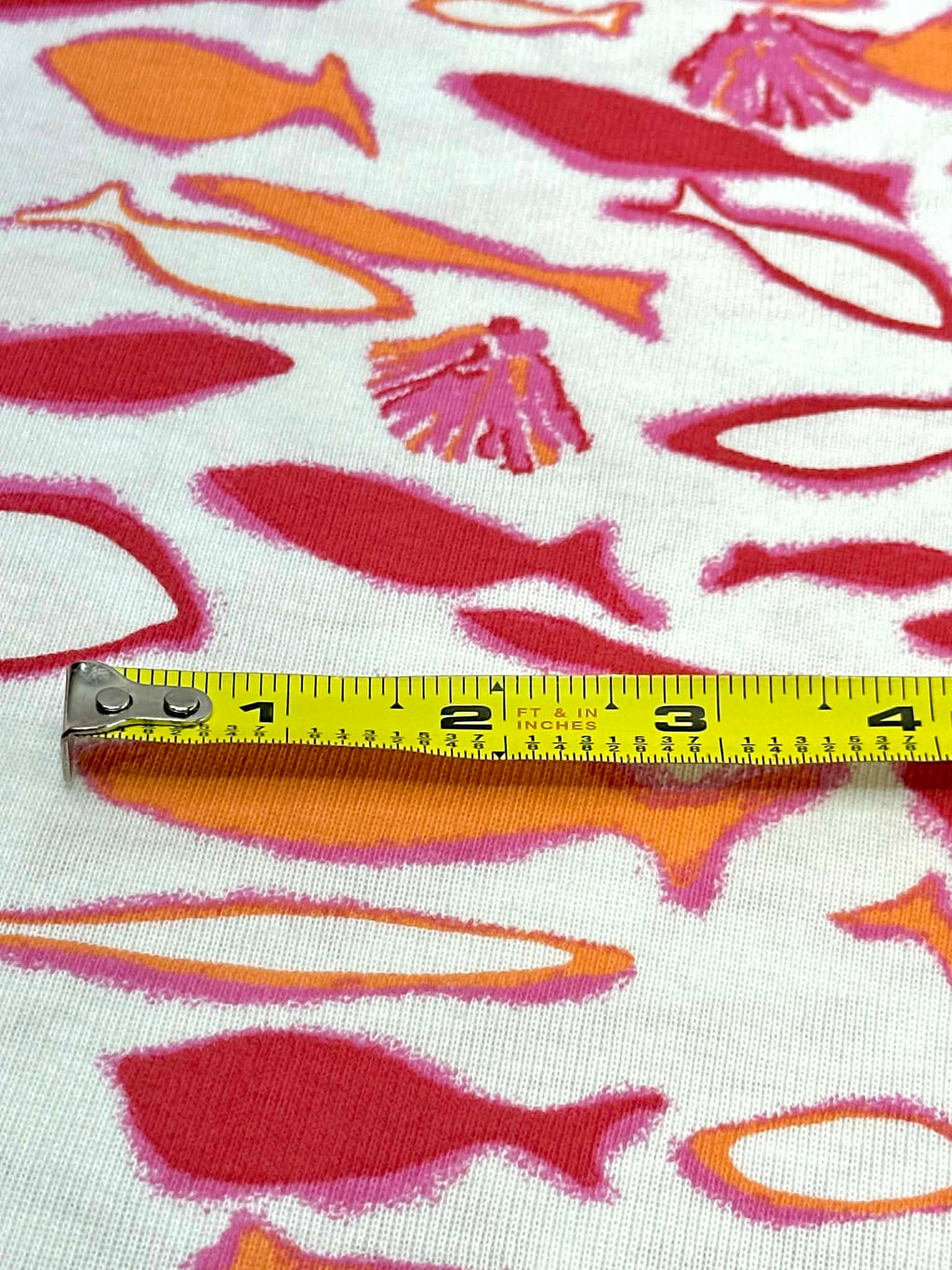 (COTTON BABY RIB) PINK, ORANGE AND RED FISH ON OFF WHITE