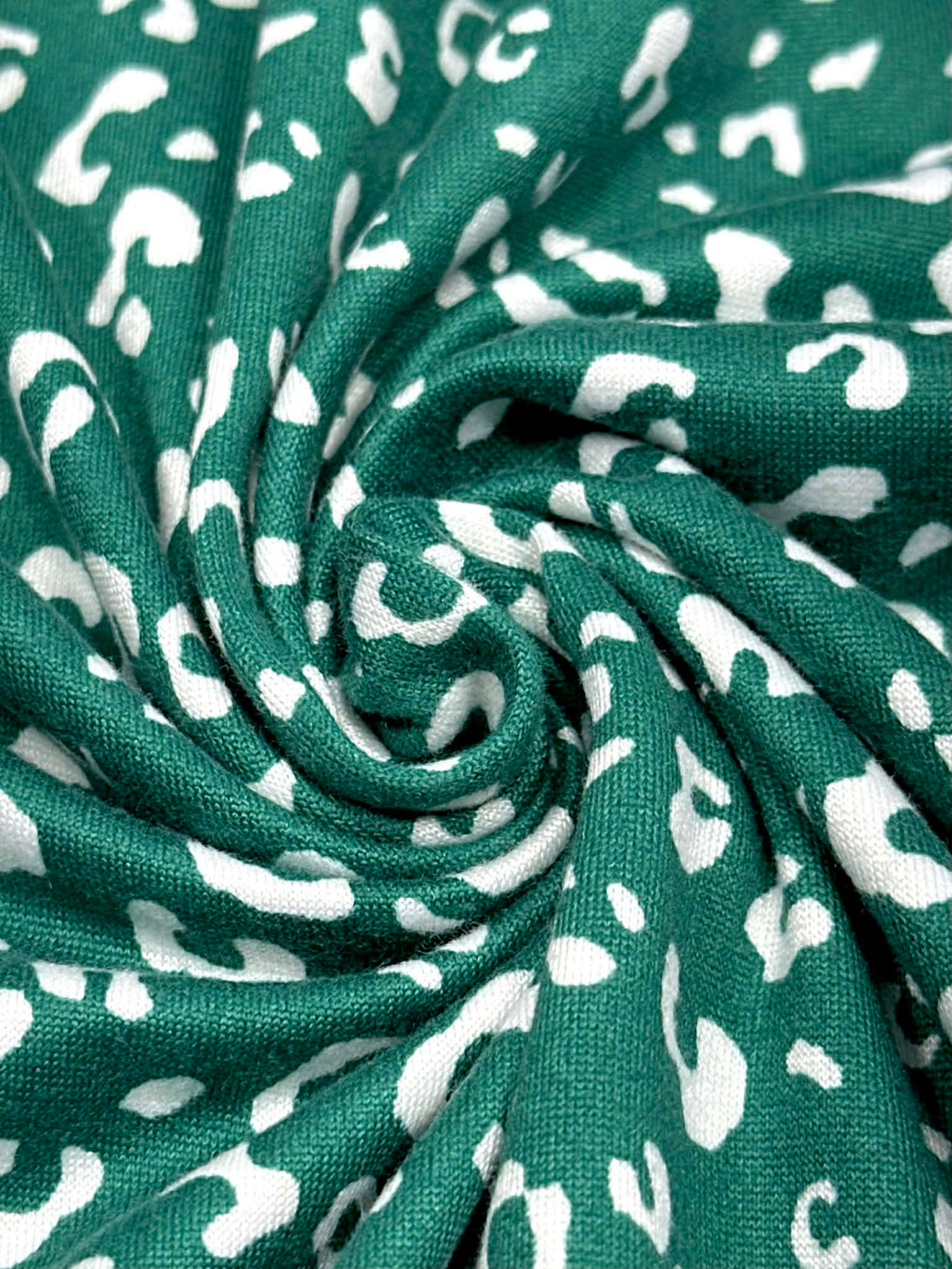 (DBP) TINY WHITE LEOPARD ON HUNTER GREEN