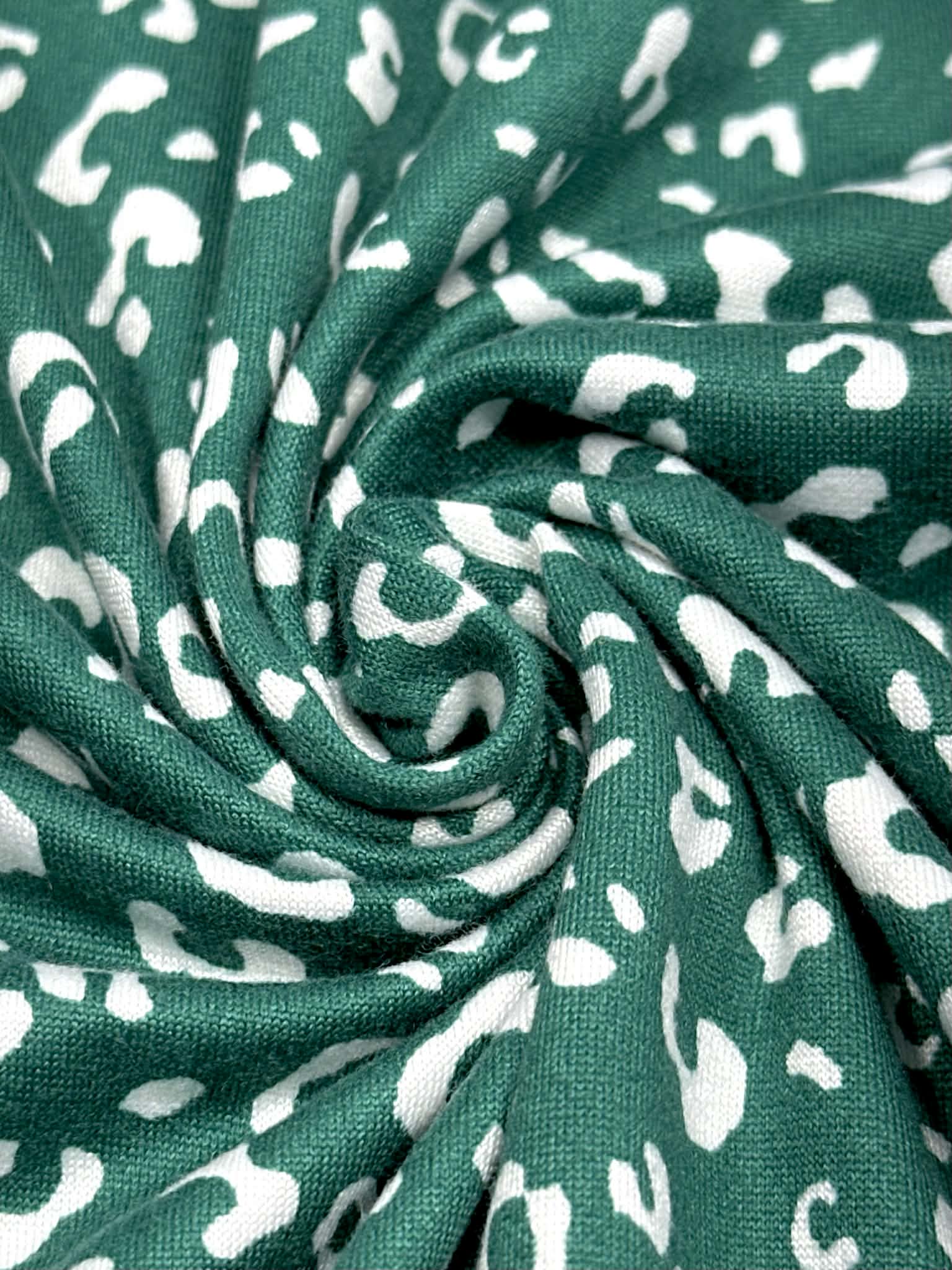(DBP) TINY WHITE LEOPARD ON HUNTER GREEN