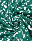 (DBP) TINY WHITE LEOPARD ON HUNTER GREEN