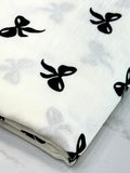 (WOVEN) BLACK BOWS ON OFF WHITE