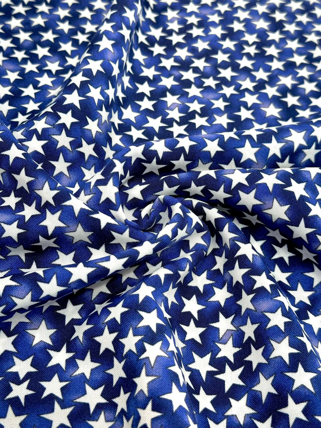 (COTTON) TINY WHITE STARS ON ROYAL BLUE