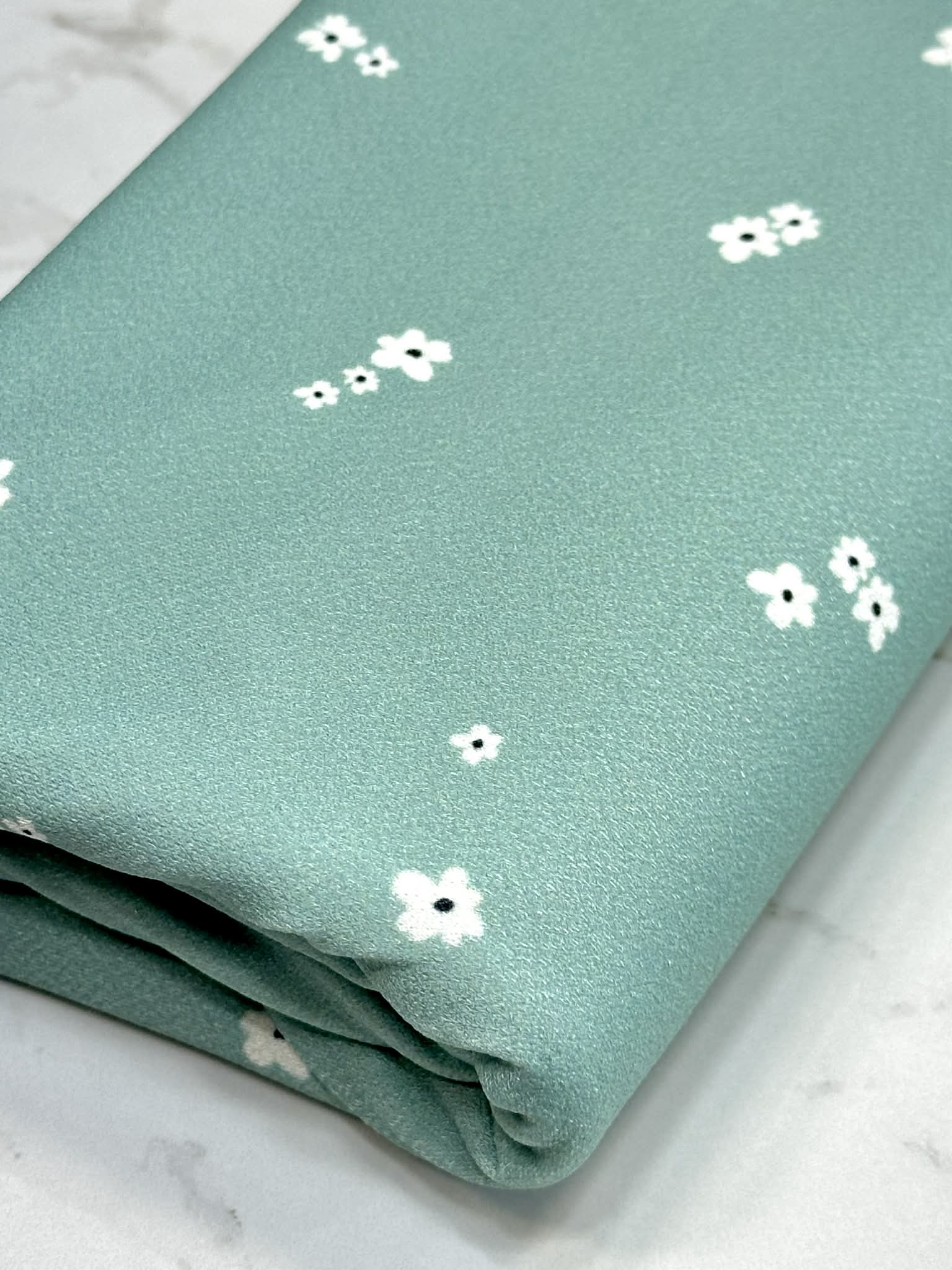(CREPE KNIT) TINY WHITE FLOWERS ON SAGE