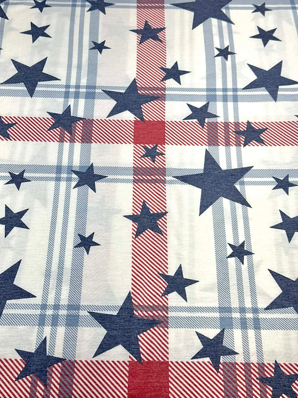 (KNIT) NAVY STARS ON RED, BLUE AND OFF WHITE PLAID