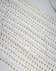 (TRIM) THIN IVORY STRIP WITH TINY PEARLS