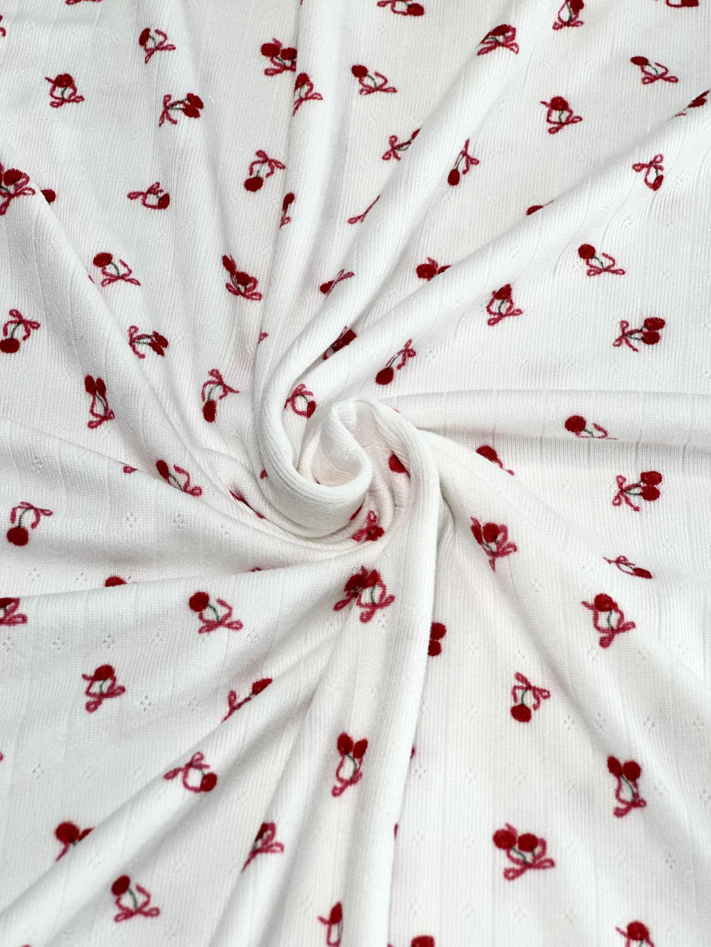 (POINTELLE RIB) TINY RED CHERRIES WITH BOWS ON OFF WHITE