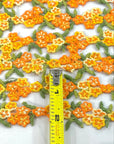 (TRIM) EMBROIDERED TANGERINE AND MUSTARD FLOWERS