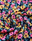 (TECHNO CREPE) BRIGHT PINK AND MUSTARD FLOWERS ON BLACK