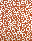 (FRENCH TERRY) IVORY DAISIES ON BURNT ORANGE