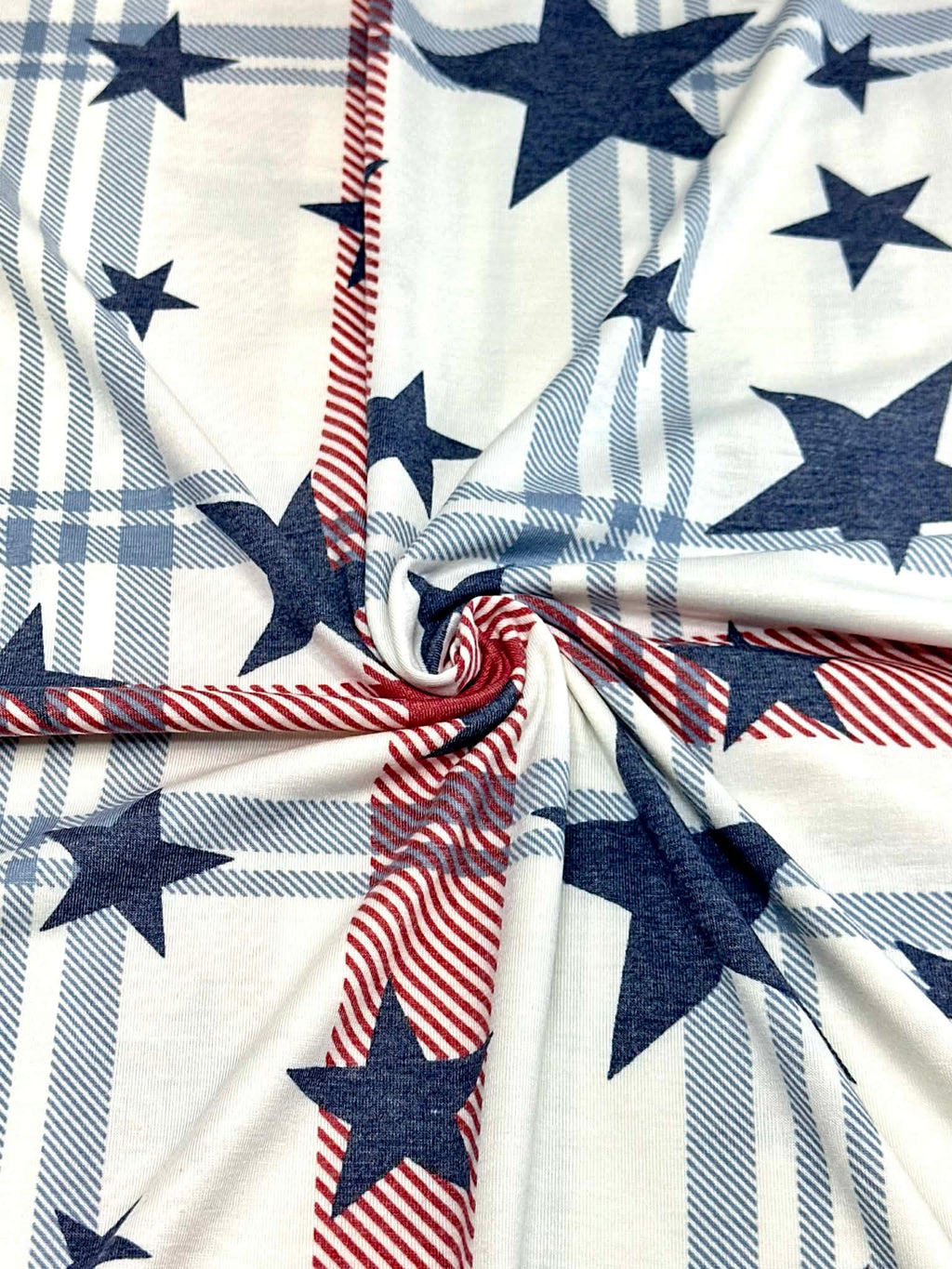 (KNIT) NAVY STARS ON RED, BLUE AND OFF WHITE PLAID