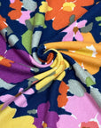 (SWEATER KNIT) PURPLE, ORANGE, YELLOW AND PINK FLOWERS ON NAVY