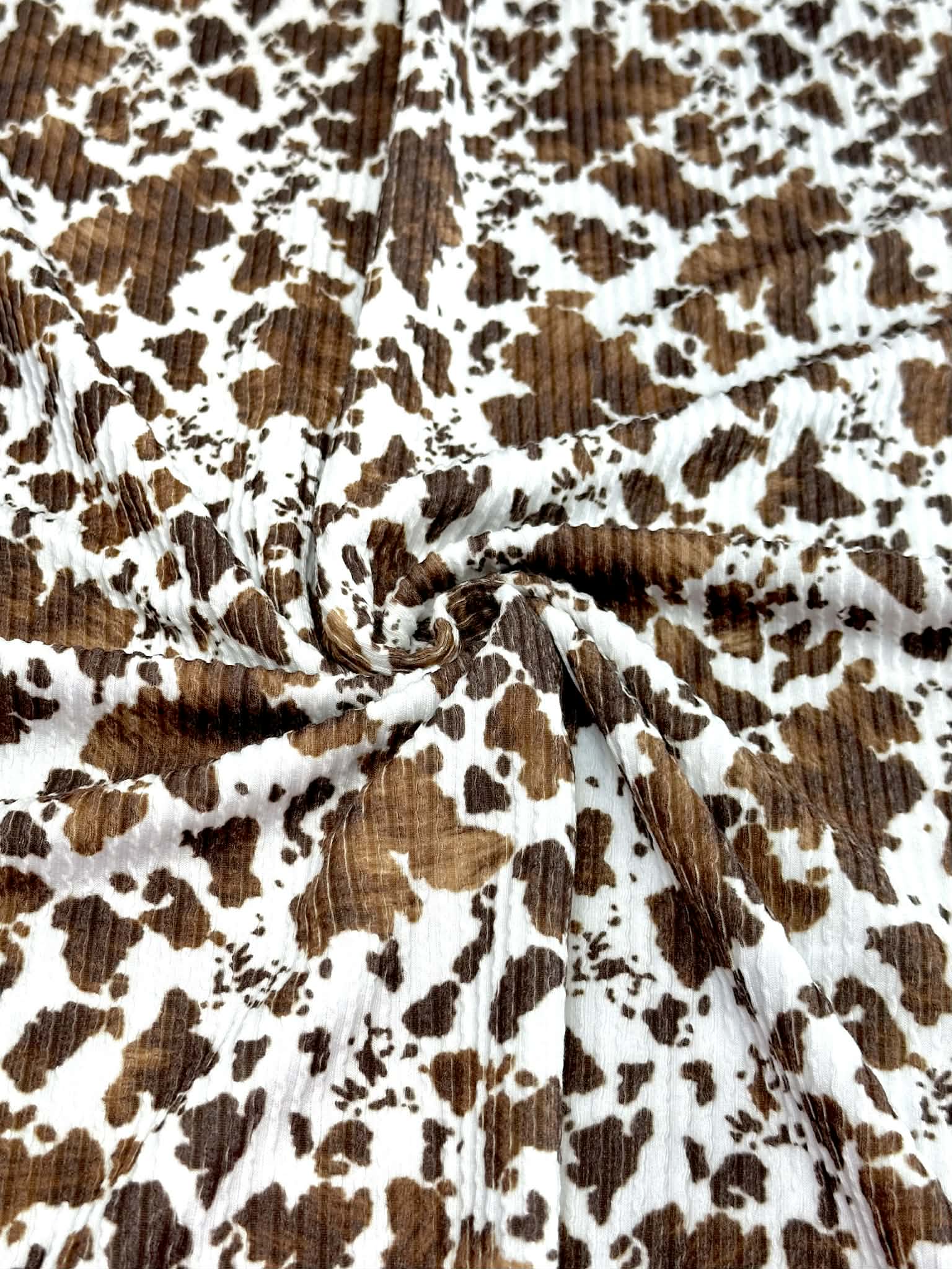 (URBAN RIB) SMALL BROWN COW FUR PRINT ON OFF WHITE