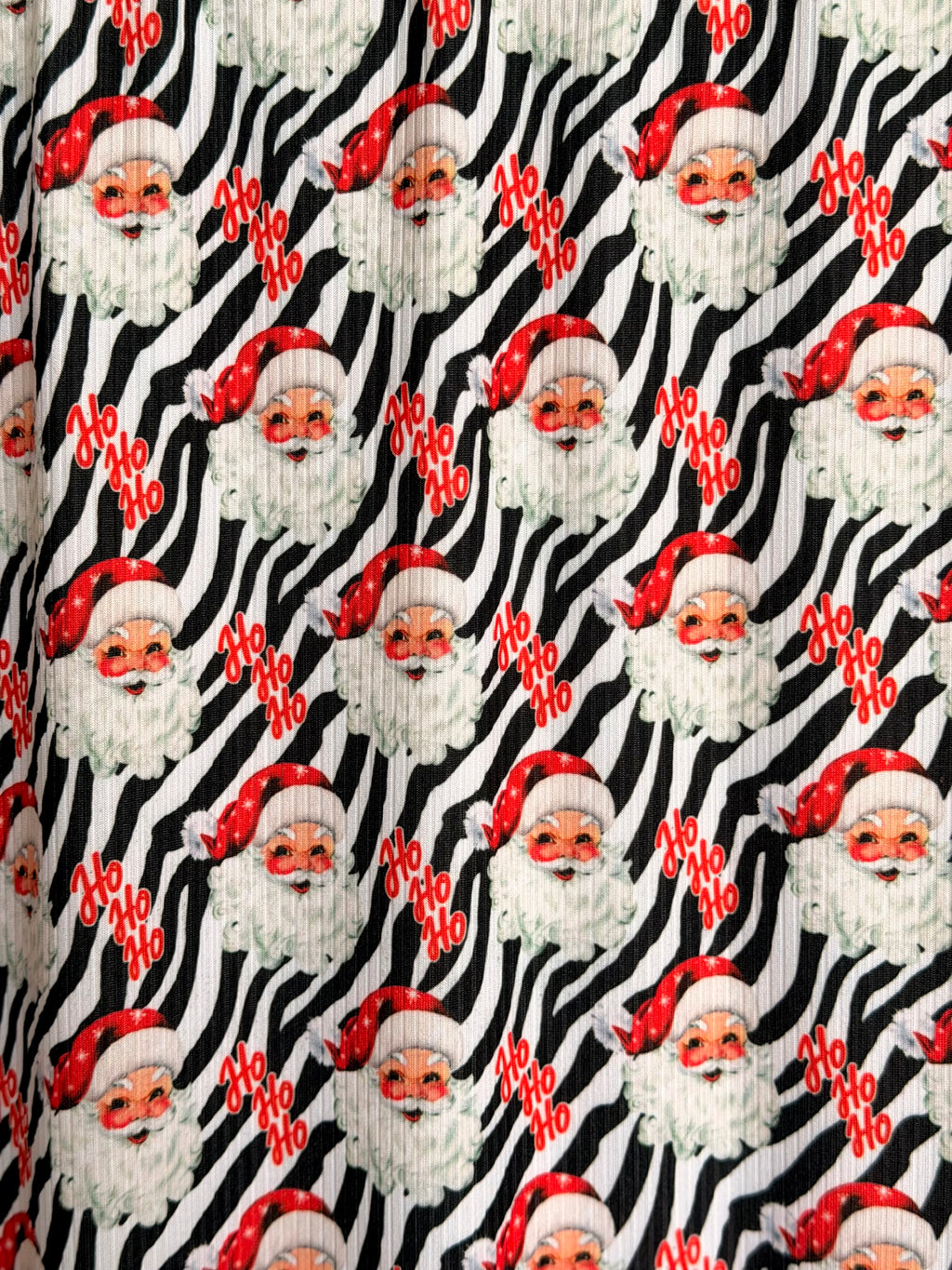 (4X2 YUMMY RIB) SMALL RED SANTA ON ZEBRA PRINT