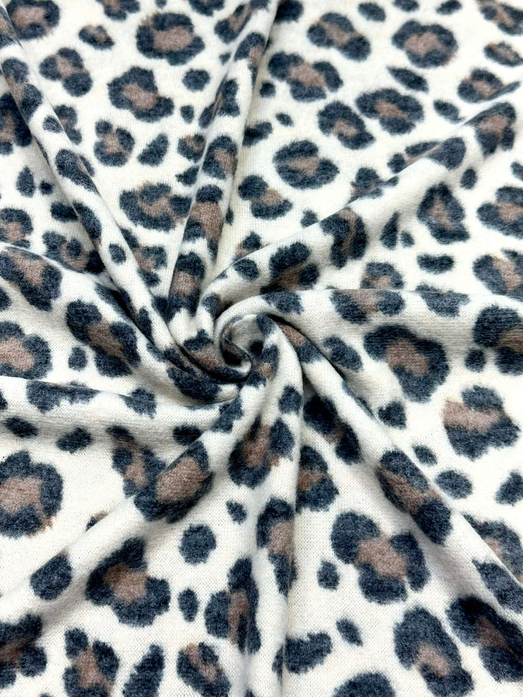 (BRUSHED SWEATER KNIT) BLACK AND BROWN CHEETAH ON CREAM