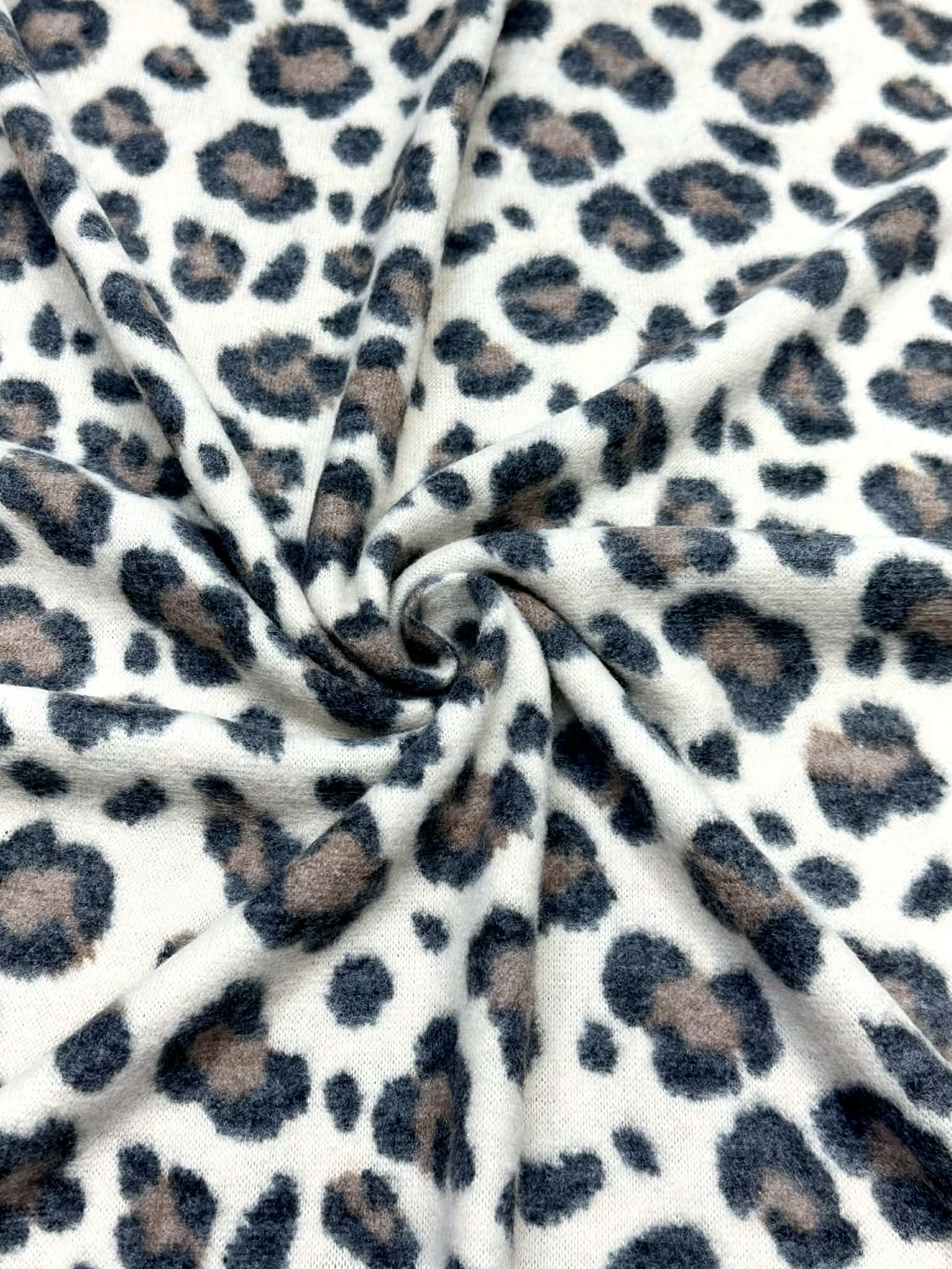 (BRUSHED SWEATER KNIT) BLACK AND BROWN CHEETAH ON CREAM