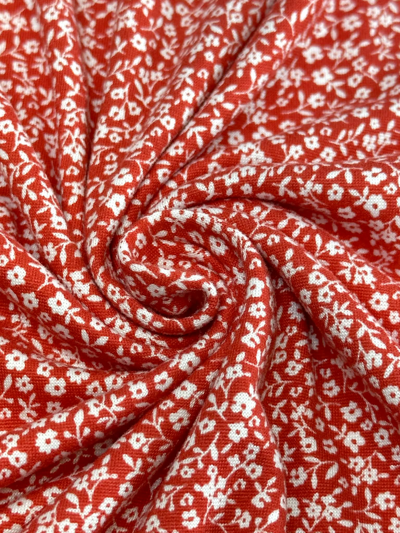 (DBP) TINY OFF WHITE FLOWERS ON RED(5)