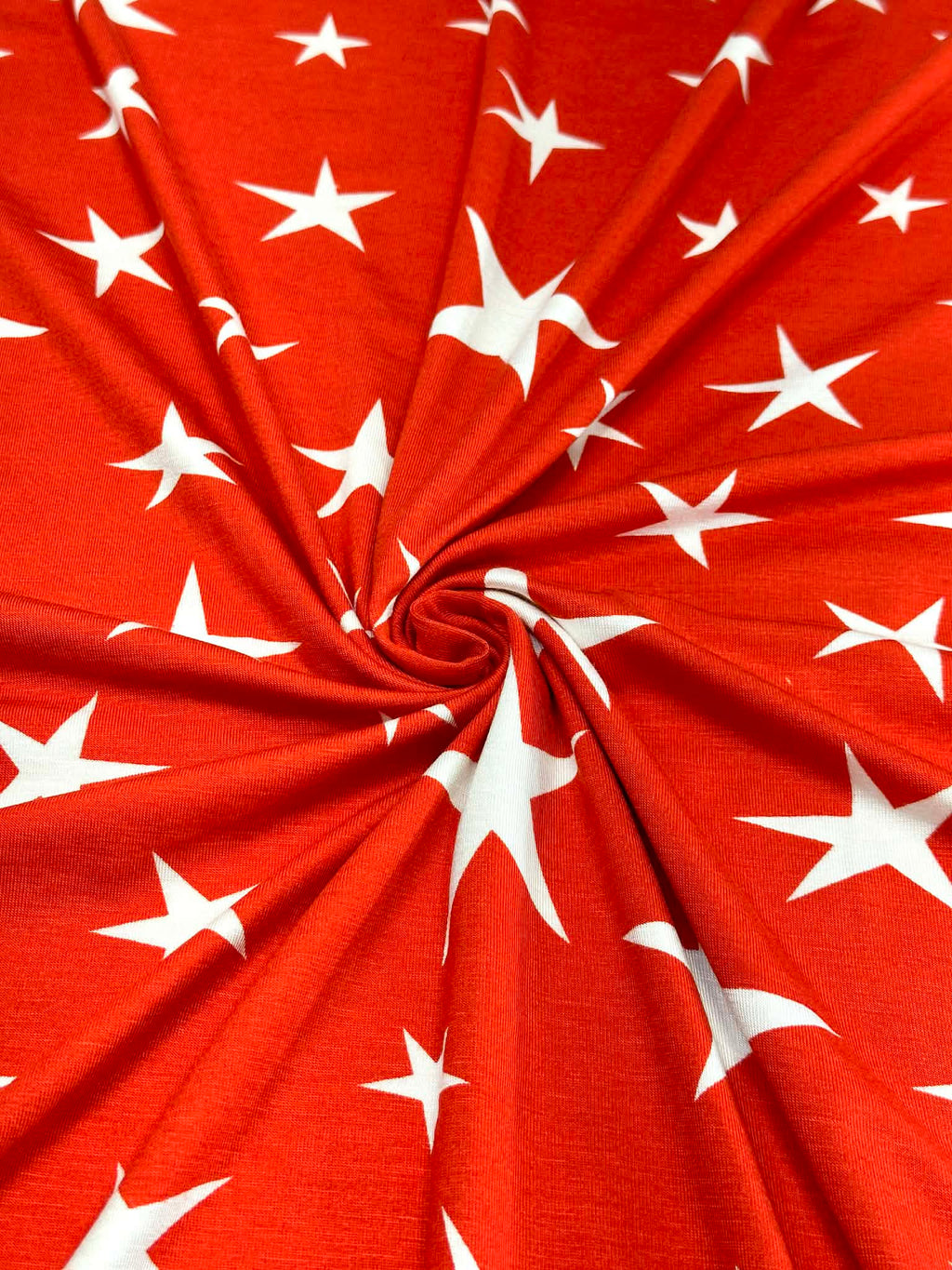 (RAYON  MODAL) OFF WHITE STARS ON RED